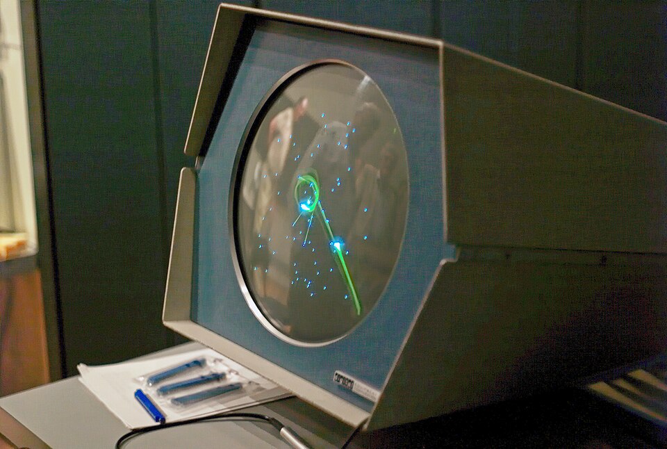 PDP-1 ekranında Spacewar, iki gemi ve yıldız